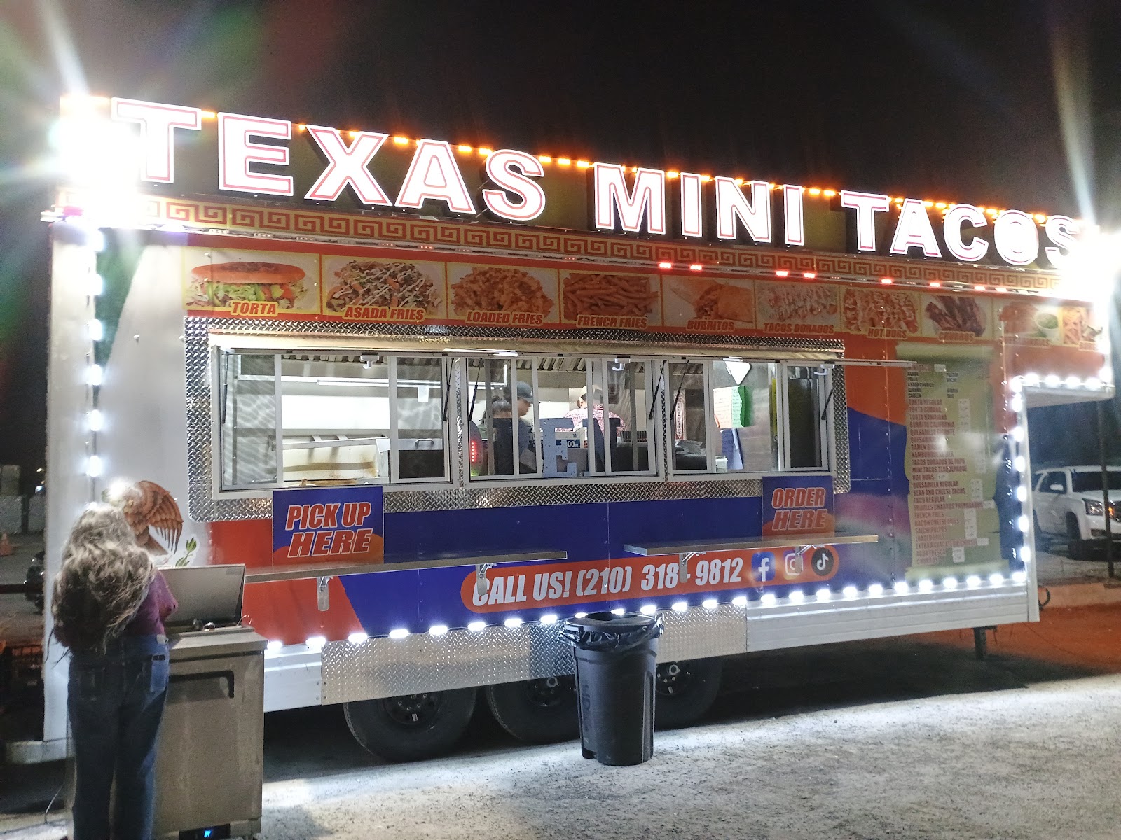 Sabor Mexican food trailer lit up at night